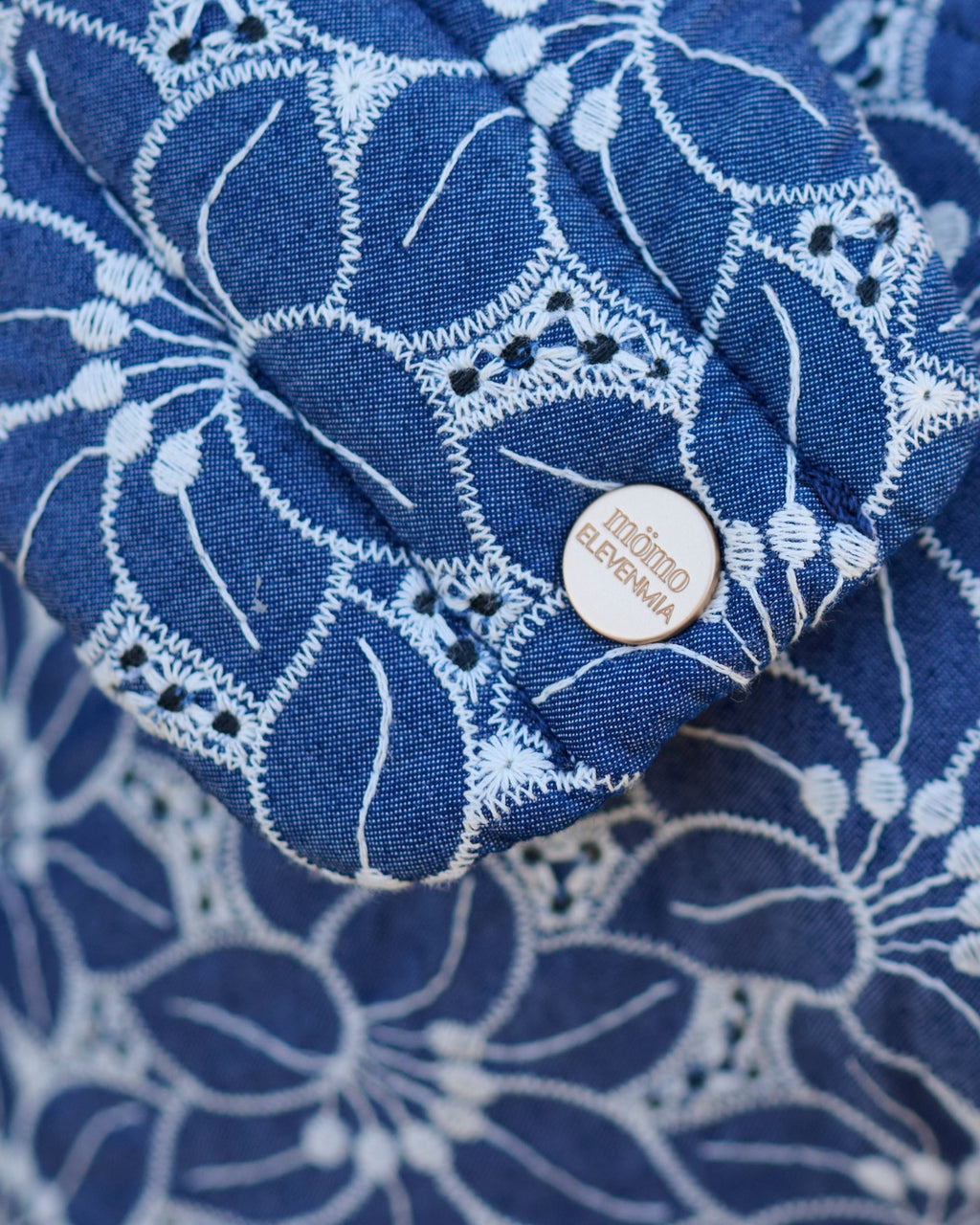 Portabebé “Apron Flower” Mömo X Elevenmia